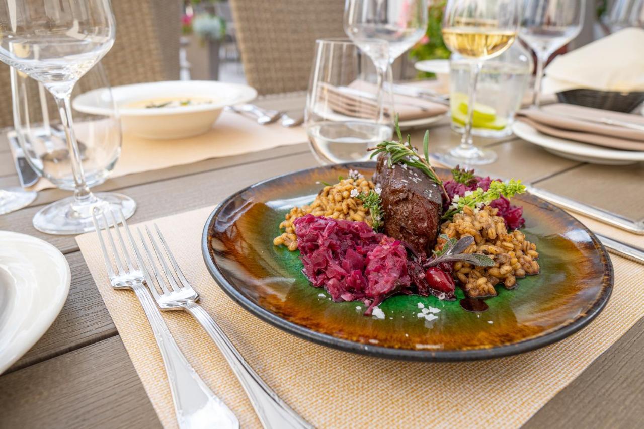 Boutique Odyseja & Spa Цехоцинек Экстерьер фото A plate of food